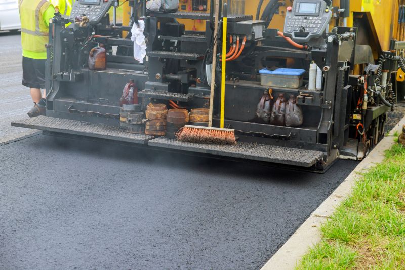 Residential Driveway with Paving Equipment